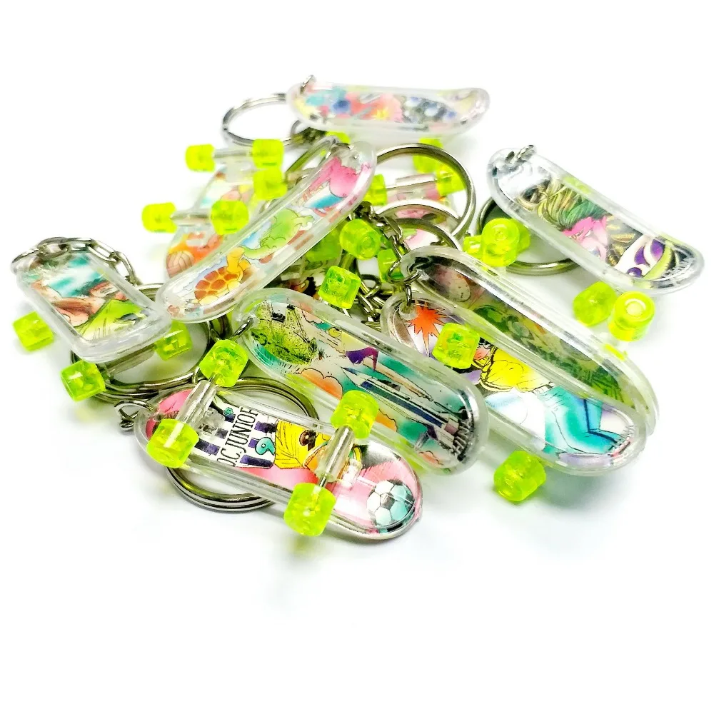 

4 pc, Mini finger Skateboard Key Chain, kids Party Favors, Pinata filler, Cake Decoration, backpack decoration, boys dress up