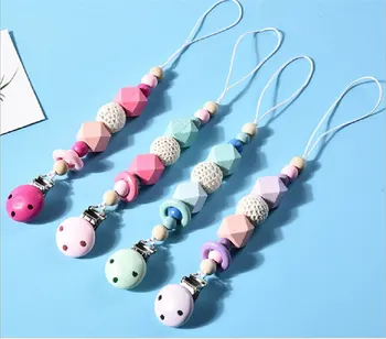 

Cute Pacifier Clips Soother Chains Silicone And Wood Pacifier Clip Wooden Bead Dummy Clip Holder Baby Teething Toy For Baby Chew