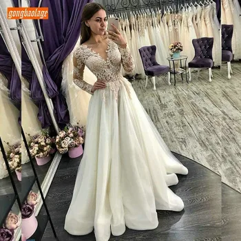 

Sexy Transparent Lace Top Appliqued Beaded Wedding Dresses Long Sleeve 2020 Elegant Tulle A-Line Celebrity Ivory Wedding Gowns