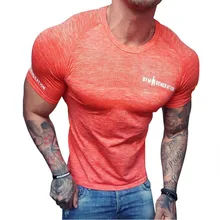 Nueva camiseta de secado rápido para correr, camisetas de fútbol ajustadas de Fitness, camiseta de compresión, Camiseta deportiva para hombre, camiseta de gimnasio, Rashgard(China)