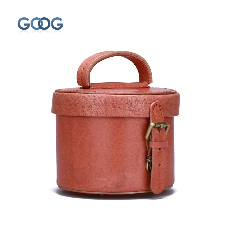 

Retro handmade solid color hand - held women 's bag cylindrical makeup bag head layer of leather belt buckle buckle