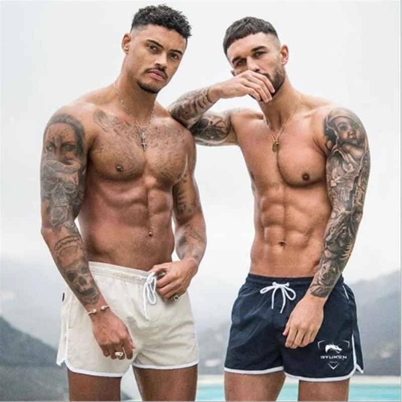 

Mens summer new fitness shorts Fashion compression Fast drying gyms Bodybuilding Joggers shorts Slim fit clothing Sweatpants