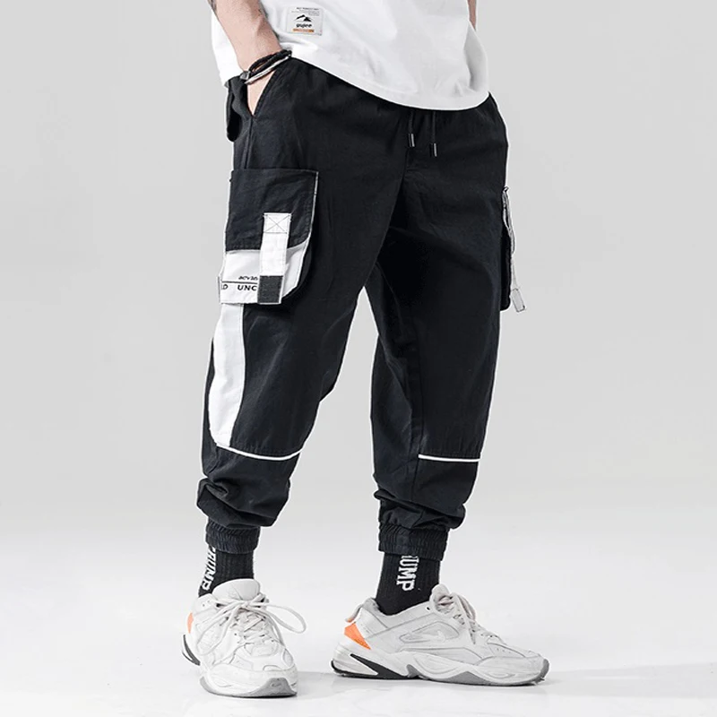 

Drop Shipping 2019 New Trend Color Patchwork Multi-Pocket Mens Jogger Trousers Autumn Casual Male Ribbon Harem Pants Streetwear
