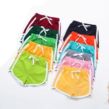 Летние детские короткие штаны Мягкие хлопковые детские повседневные однотонные пляжные шорты ярких цветов для маленьких девочек и мальчиков