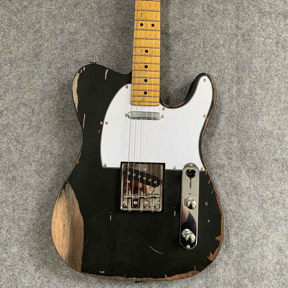 

Ancient relics electric guitar, tele black guitar, when gifts to friends, collection. Free shipping.