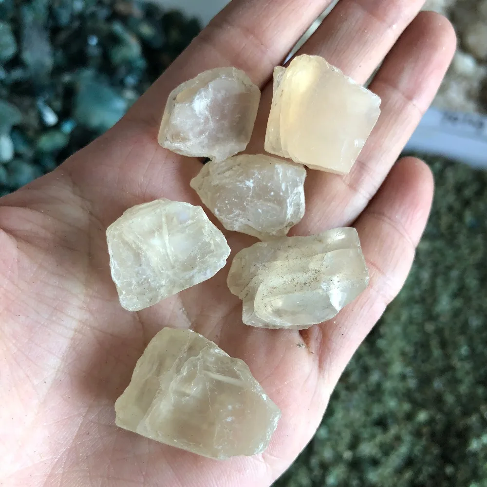 

200g mixed size rough white moonstone specimen