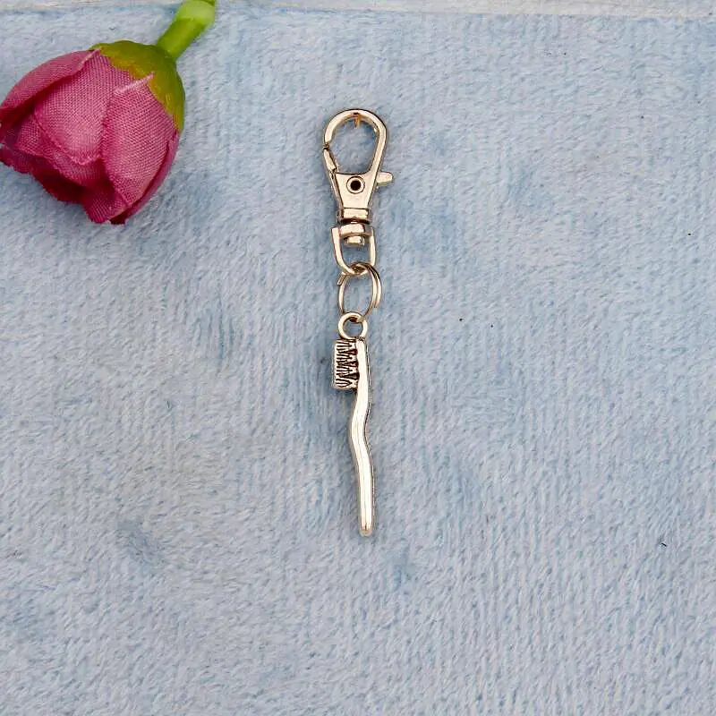 Hot 20pcs Vintage Silver Toothbrush Charm Rotation Lobster Button DIY Key Chains Accessories