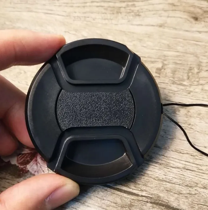 

For Nikon lens cap p510 p520 p530 digital telephoto camera lens cap protects the front cover with anti-lost rope