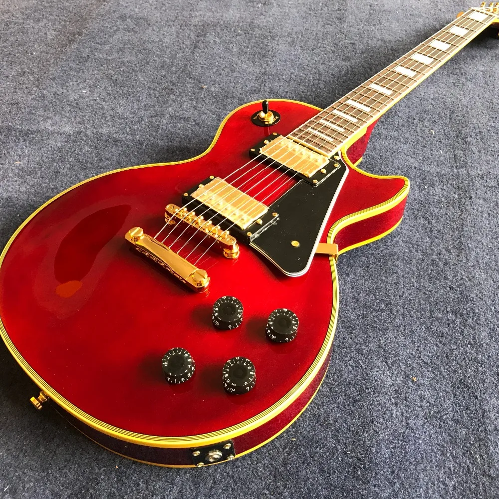

Wholesale Chinese factory OEM red color electric guitar with yellow binding and logo , hot selling high quality guitar
