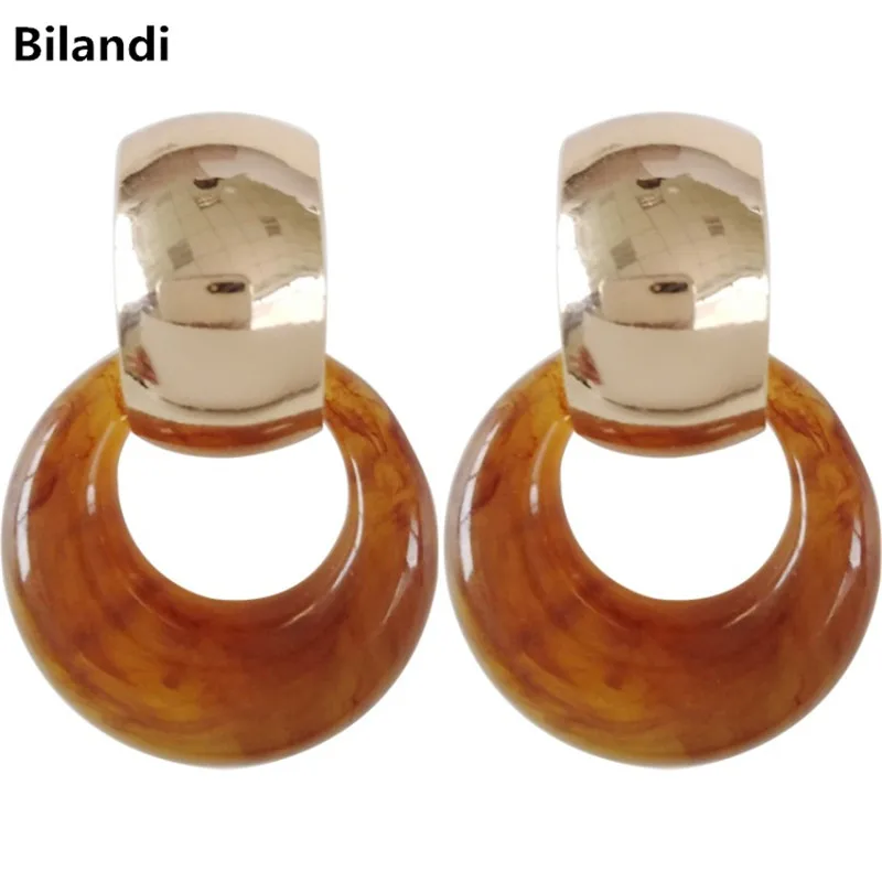 

Fancy Retro Style Round Metal With Resin Withe Brown Circular Earrings For Women