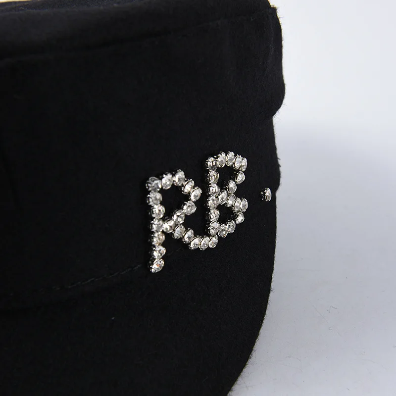 Cena USPOP 2019 nowe czapki zimowe dla kobiet wełniane gazeciarz czapki diamentowe litery grube płasko zakończony daszki ochronne wojskowe czapki