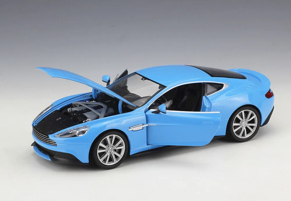 Welly 1:24 Aston Martin Vanquish черная литая модель спортивная гоночная машина игрушечная