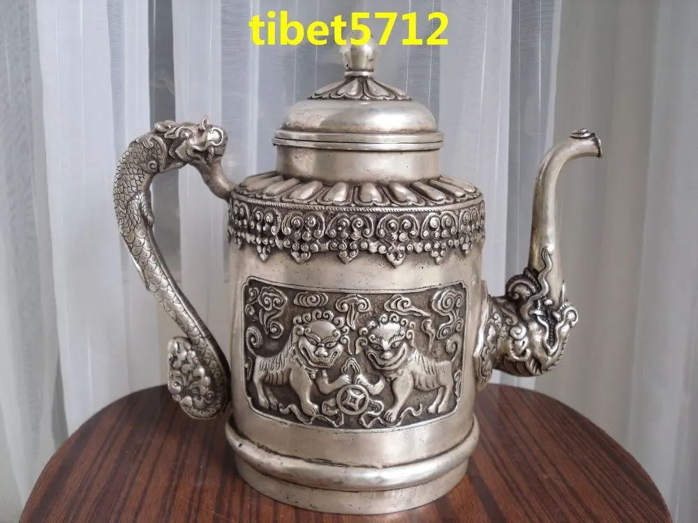 

23 cm tall Tibetan bronze dragon foo dog statue teapots pot fast shippingGarden Decoration 100% real Tibetan Silver Brass