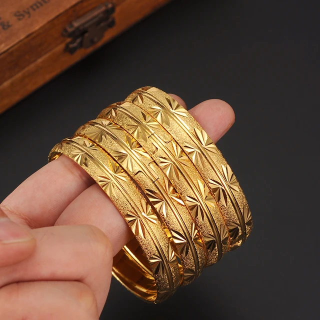 Gold bangles for old woman pictures