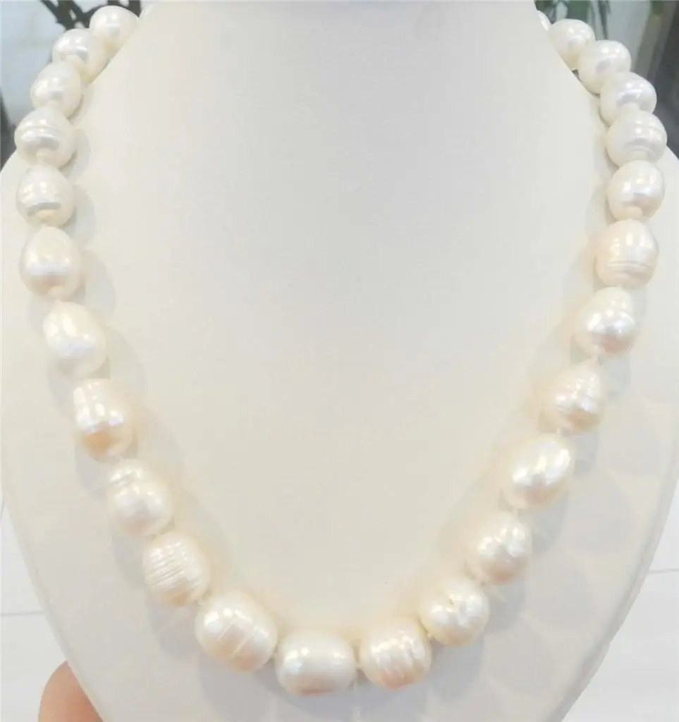 

Wholesale FREE SHIPPING 17 INCHES LONG. BIG RICE SHAPE 9-10MM WHITE REAL NATURAL PEARL NECKLACE AAA