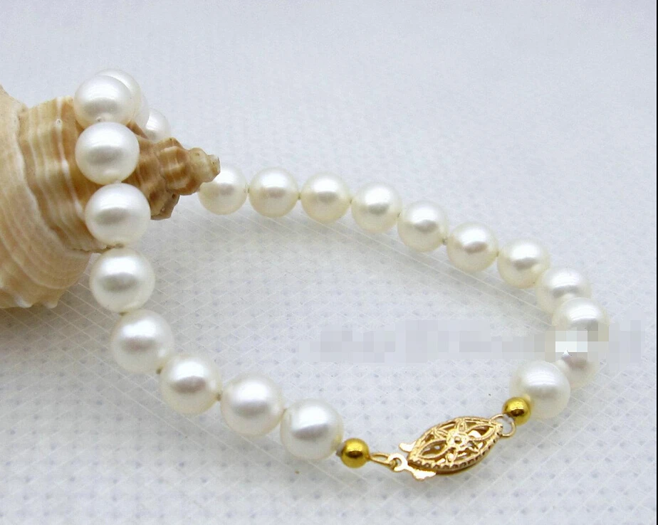 

shipping7-7.5mm Fine White AAA+ Akoya Pearl Bracelet 7.5