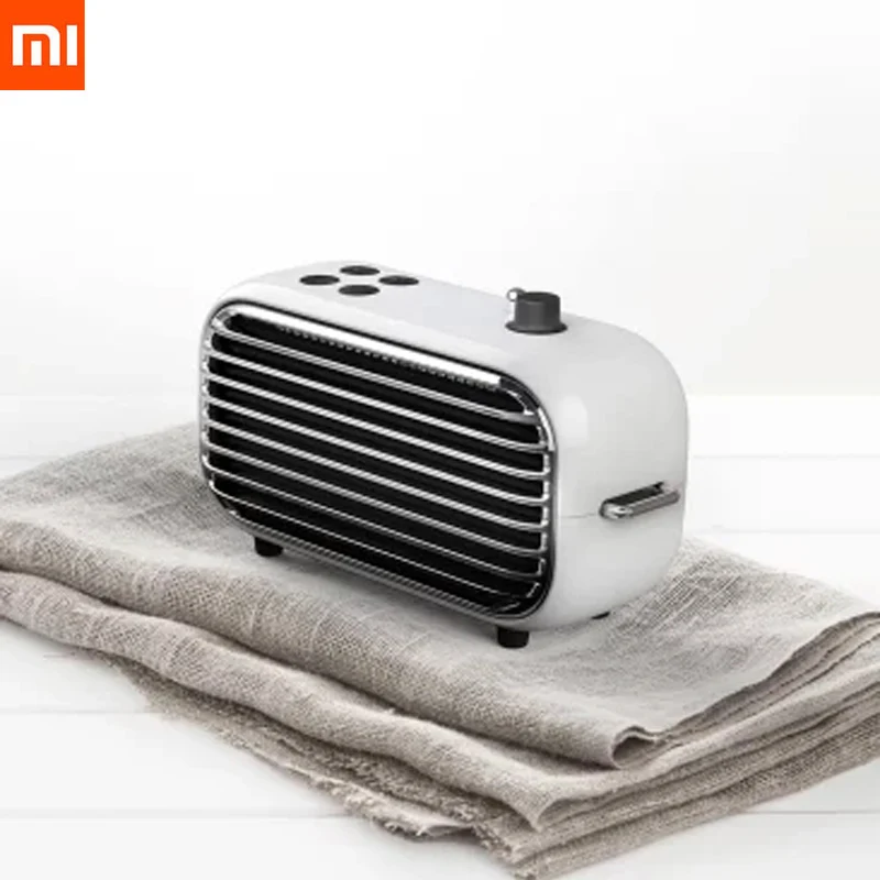 

Latest xiaomi mijia LOFREE Bluetooth speaker fashion retro lightweight portable FM radio Bluetooth cable dual mode Smart Speaker