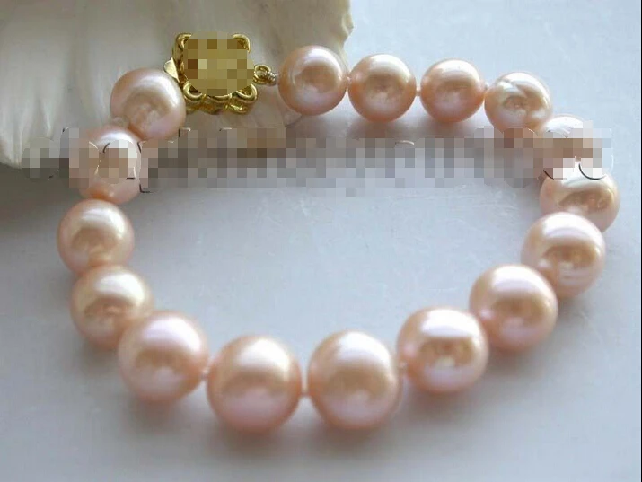 

Free shipping >>>>>>8" Natural 12mm Pink ROund shell Bracelet!