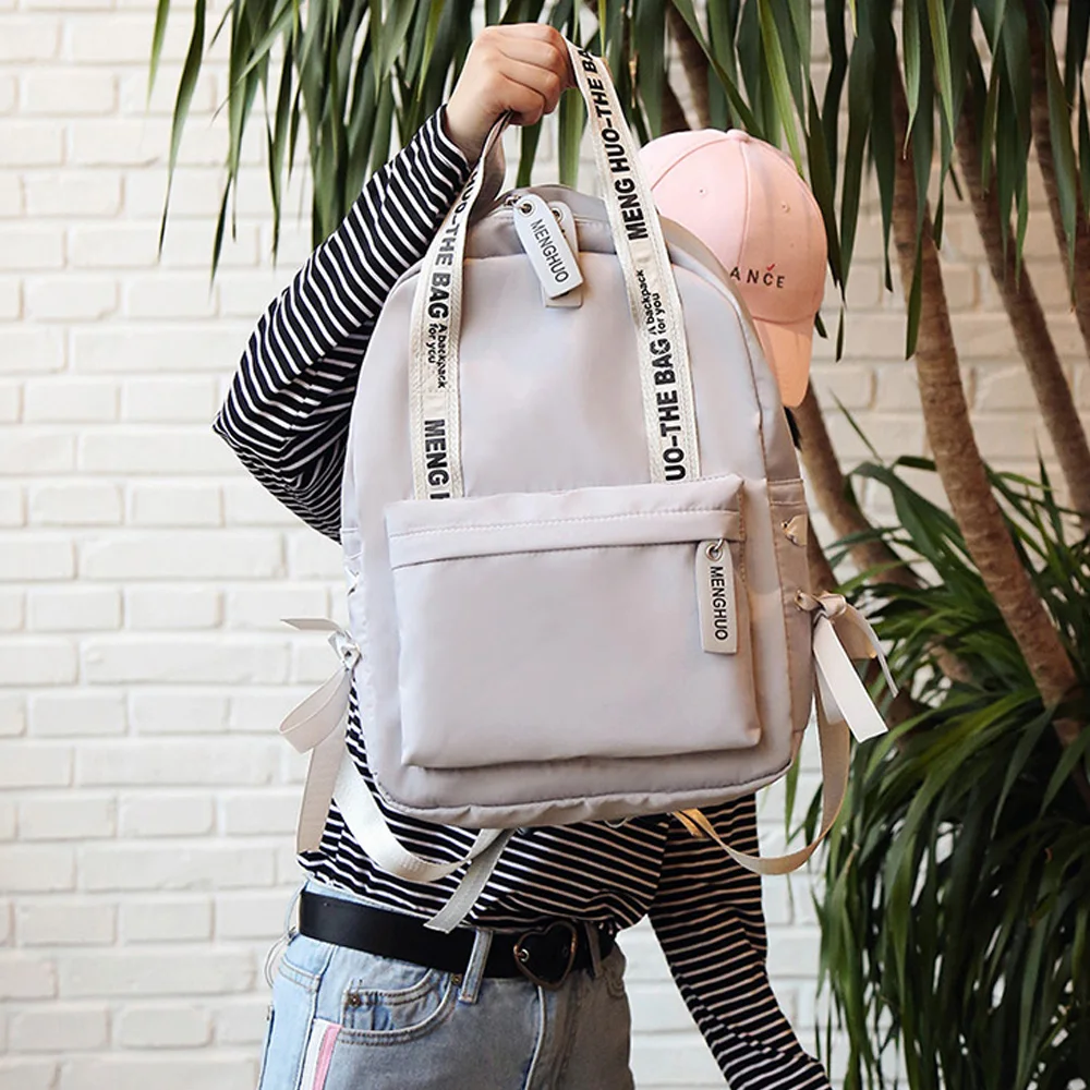 Menghuo حقيبة ظهر بسعة كبيرة النساء Preppy المدرسة حقائب للمراهقين الإناث النايلون السفر أكياس الفتيات Bowknot على ظهره Mochilas