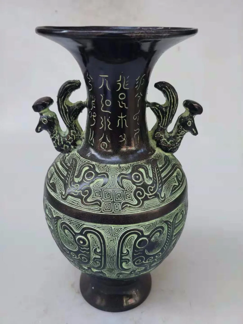 

Chinese hand carved bronze double-phoenix oracle bone vase
