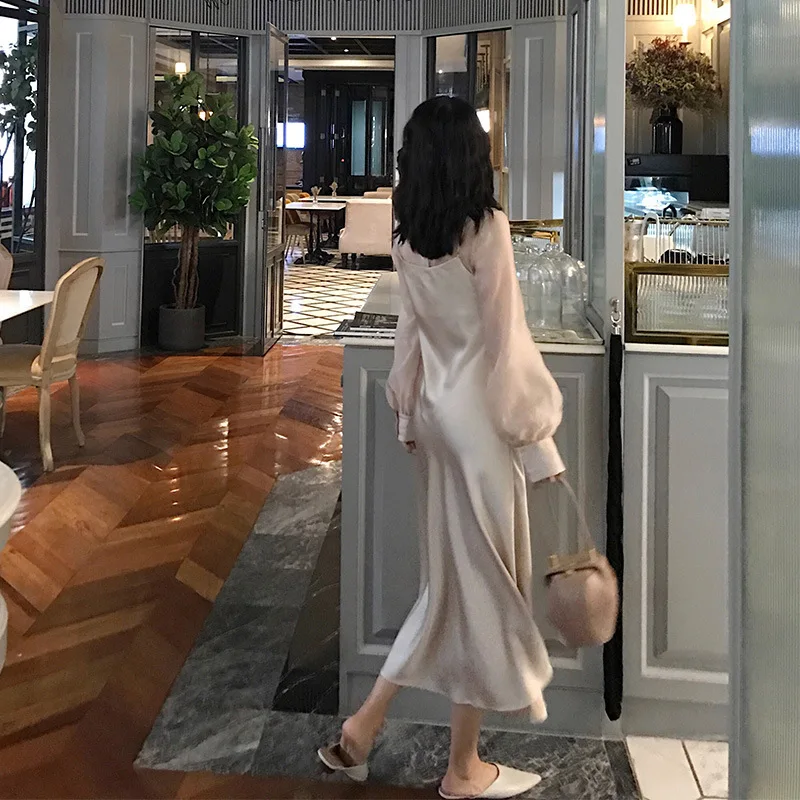 

of restoring ancient ways with the new version of its 2019 spring and summer dress long French silky satin strap dress