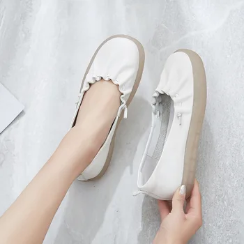 

2019 spring new fashion home Yue solid color lace flat shoes women leather comfortable tendon sole casual shoes.