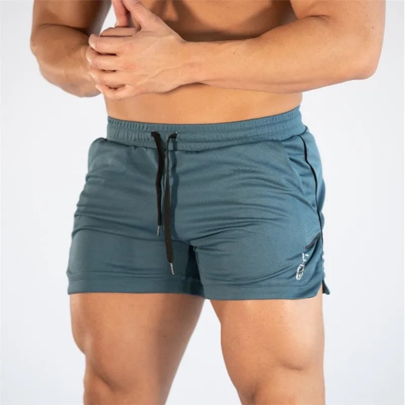 Летние пляжные шорты для мужчин s Фитнес Бодибилдинг дышащие быстросохнущие короткие спортивные мужские повседневные шорты для бега - Цвет: ink blue