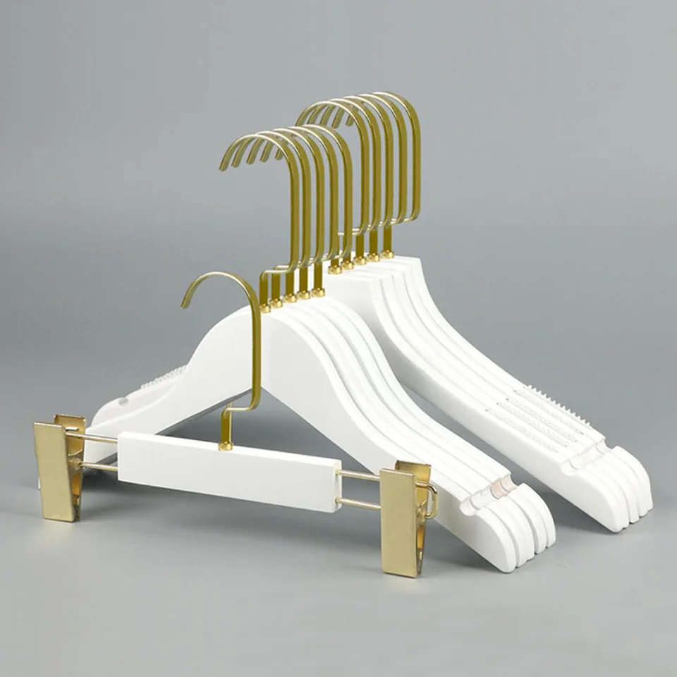 wood hanger with gold hook wood hanger with gold hook
