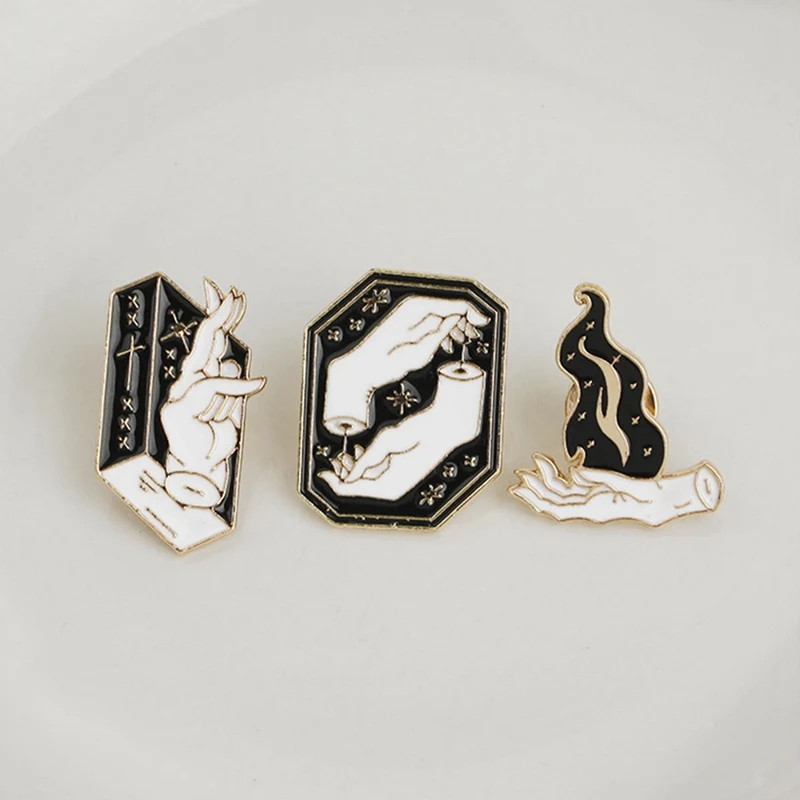 

New Sorcerer Finger Brooch Jewelry Black Witch And Manual Flame Enamel Pin Black And White Hand Pins Shirt Denim Badge