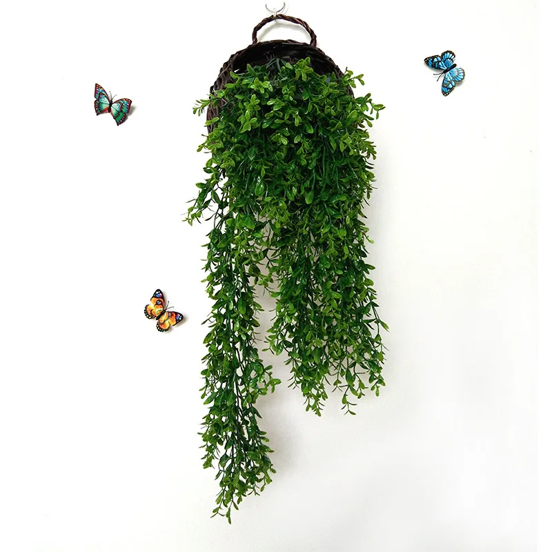 

Decorative plastic weeds with cane walls imitating golden bells and willows Bird's nest basket hanging on the wall