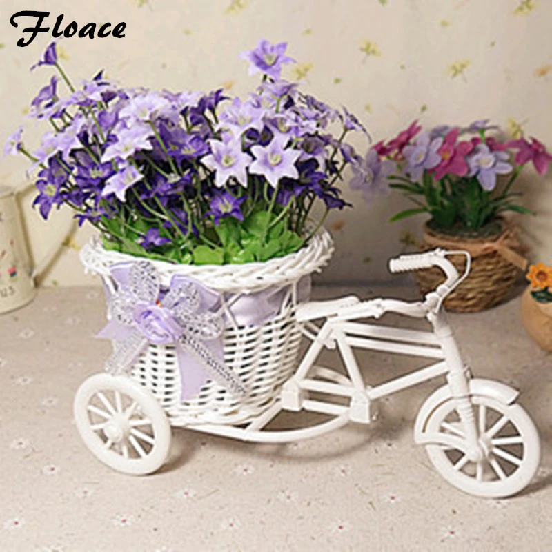 triciclo con flores