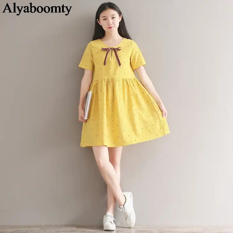 white dress with yellow polka dots