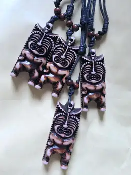 

FREE SHIPPING yqtdmy 12 pcs Cool Tribal YAK BONE Carved Tiki Man Totem Pendant Necklace Amulet Gift