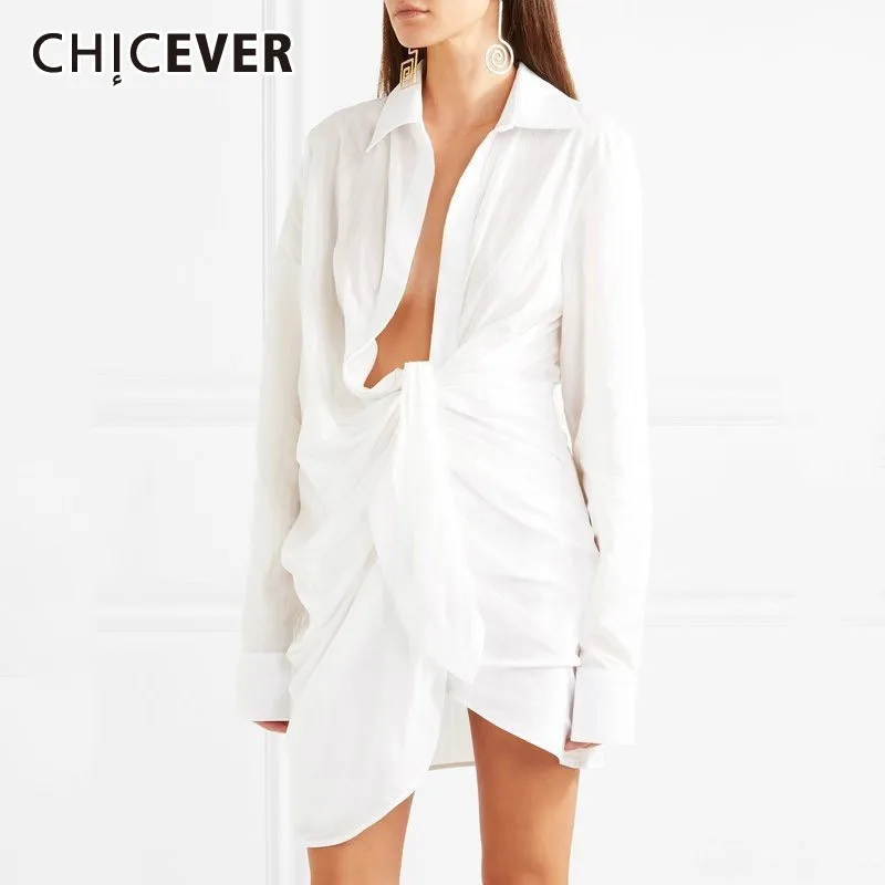 

CHICEVER Summer Casual White Women Shirt Lapel Long Sleeve Hollow Out Bandage Bow Knee Length Female Shirt 2019 Fashion New Tide