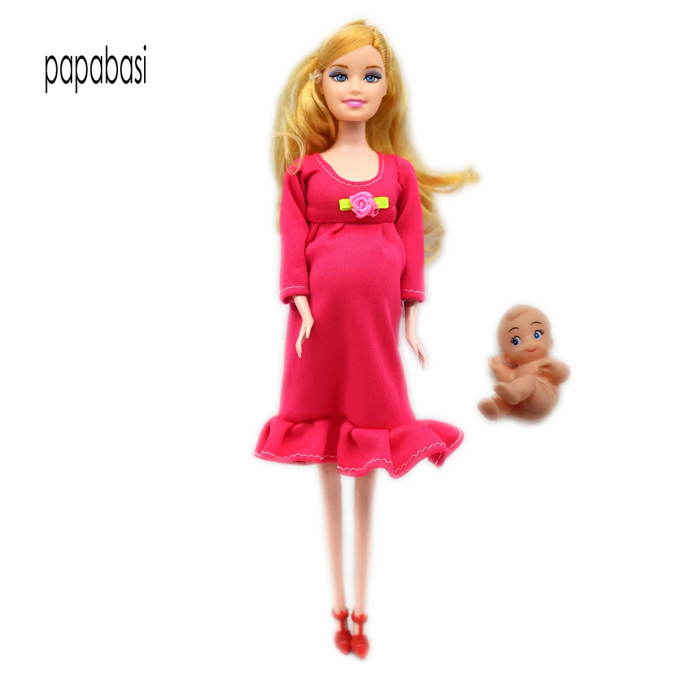 muñeca con bebe en la panza