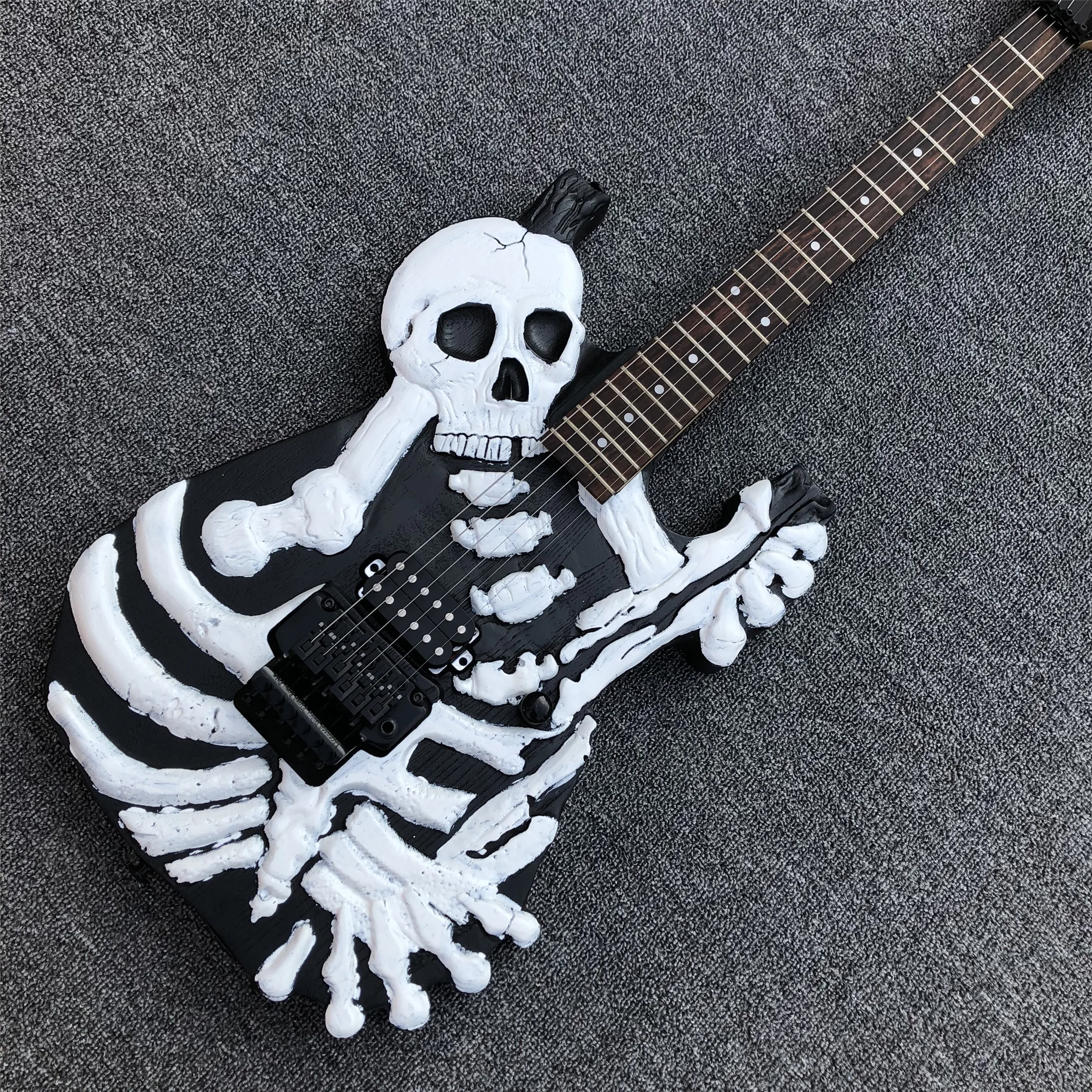 

Hot!Top quality Black Skull body Electric Guitar,Factory bone top Solid wood Electric Guitar Black hardware,Free shipping