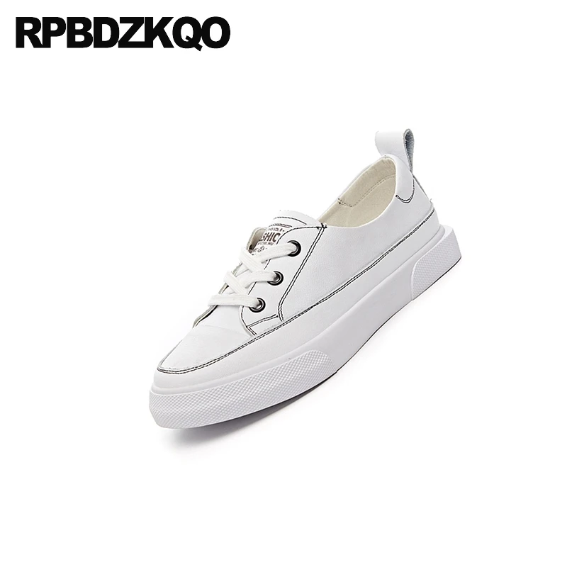 ladies white designer trainers