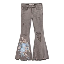 Осенне-весенние повседневные женские рваные Стрейчевые расклешенные джинсовые брюки, женские эластичные джинсовые брюки с аппликацией и цветочным узором
