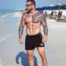 Новые мужские тренажерные залы фитнес свободные шорты для бега Бодибилдинг летние быстросохнущие классные короткие мужские брюки повседневные пляжные тренировочные брюки