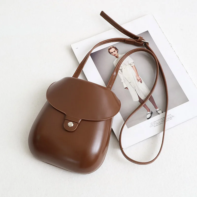 

2018 literary retro small fresh solid color PU casual wild cute shoulder bag Messenger bag mobile phone bag female