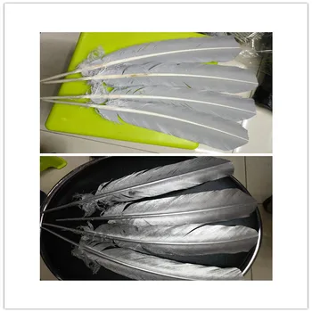 

Wholesale 100 pcs silver turkish feather 10-12 inch /25-30 cm silver turkish feathers crafts for Christmas wedding decoration