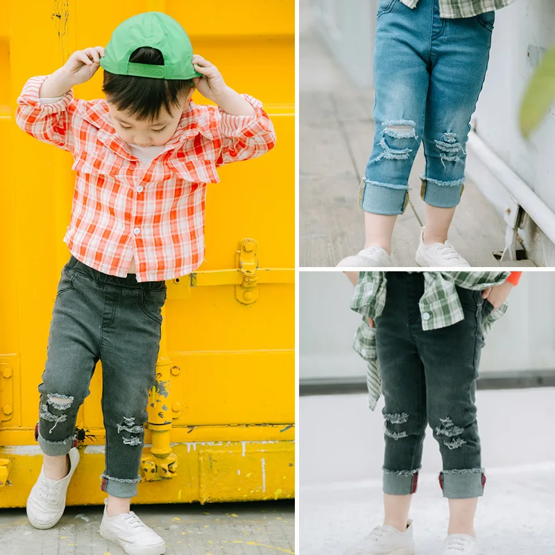 

The spring of 2017 new boy elastic cotton ripped jeans casual pants in child Korean fashion