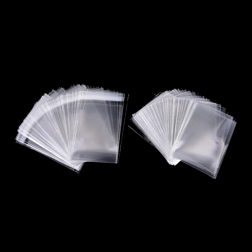 

100 Pcs 61 * 88mm Hot Card Sleeves Cards Protector Barrie magic board game sleeves bags