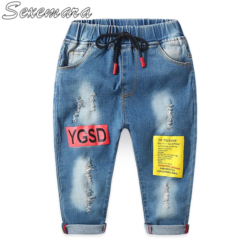 

SexeMara 2018 new children's wild cartoon patch jeans children's clothing boy hole trousers tide