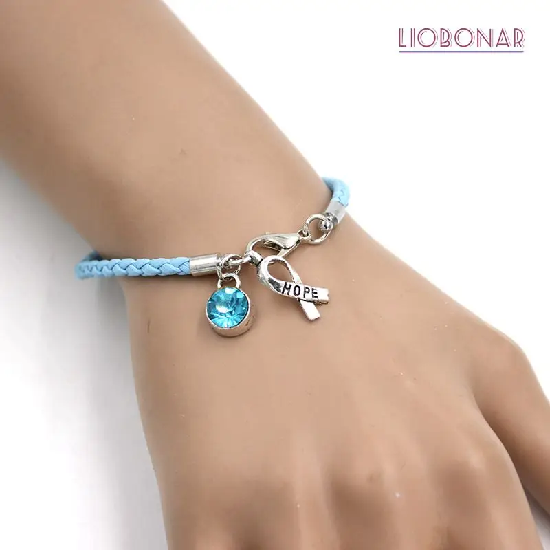 

10PCS Wholesale Light Blue Awareness Bracelet Jewelry PU Leather Hope Ribbon Charm Bracelets for Cancer Center Foundation Gift
