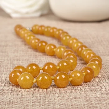 

The beautiful 10 mm Bright yellow and Long strip Topaz jasper. Double Eleven Gifts for family and friends