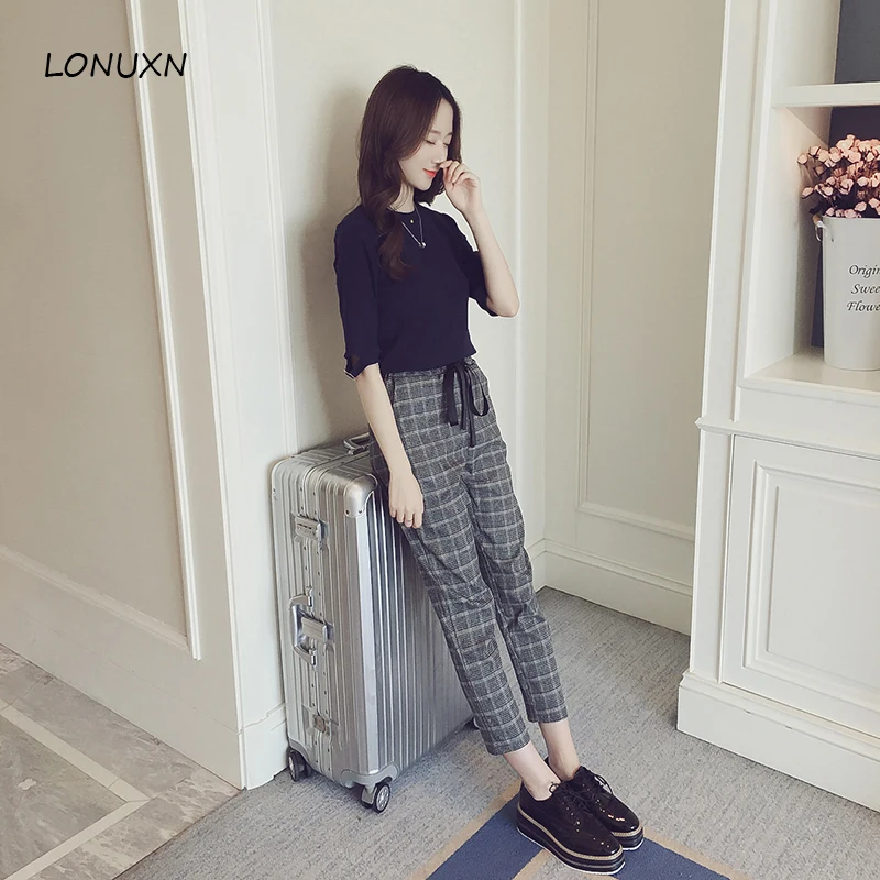 

2 pieces 2 colors, autumn winter, the Korean temperament 7 pants, sleeve knitted jacket + Plaid casual pants, fashionable suit