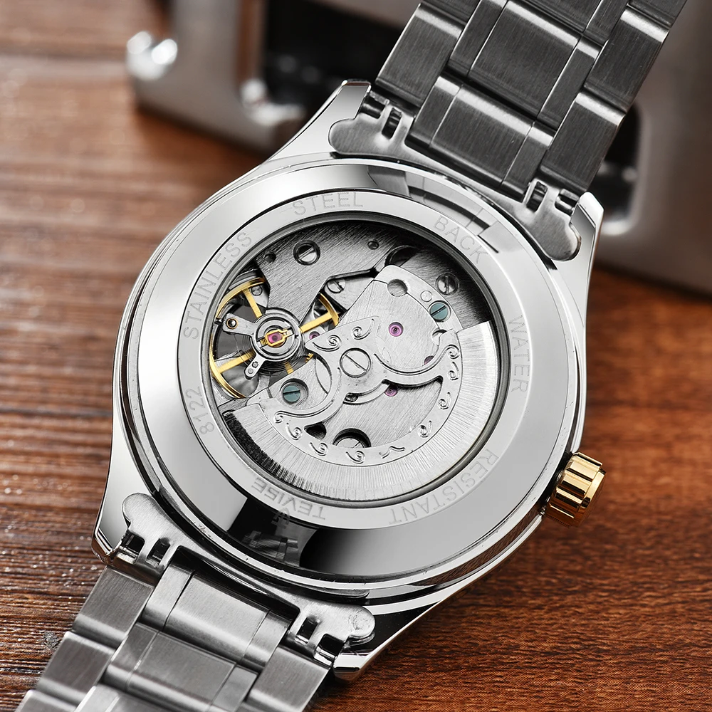 TEVISE الذاتي لف الساعات الرجال ساعات آلية القمر الأزياء عارضة المرحلة الفولاذ المقاوم للصدأ التلقائي حركة ساعة اليد 8122A TEVISE الذاتي لف الساعات الرجال ساعات آلية القمر الأزياء عارضة المرحلة الفولاذ المقاوم للصدأ التلقائي حركة ساعة اليد 8122A