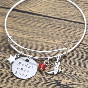 

12pcs/lot Toy Movie Inspired bracelet Cowgirl Jessie yodel-ay-ee-hooo". crystal, for women or girls bangle