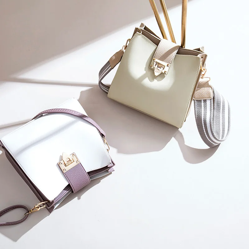 

The new small bag wide shoulder bucket bag female 2019 new tidal summer oblique bag simple shoulder bag